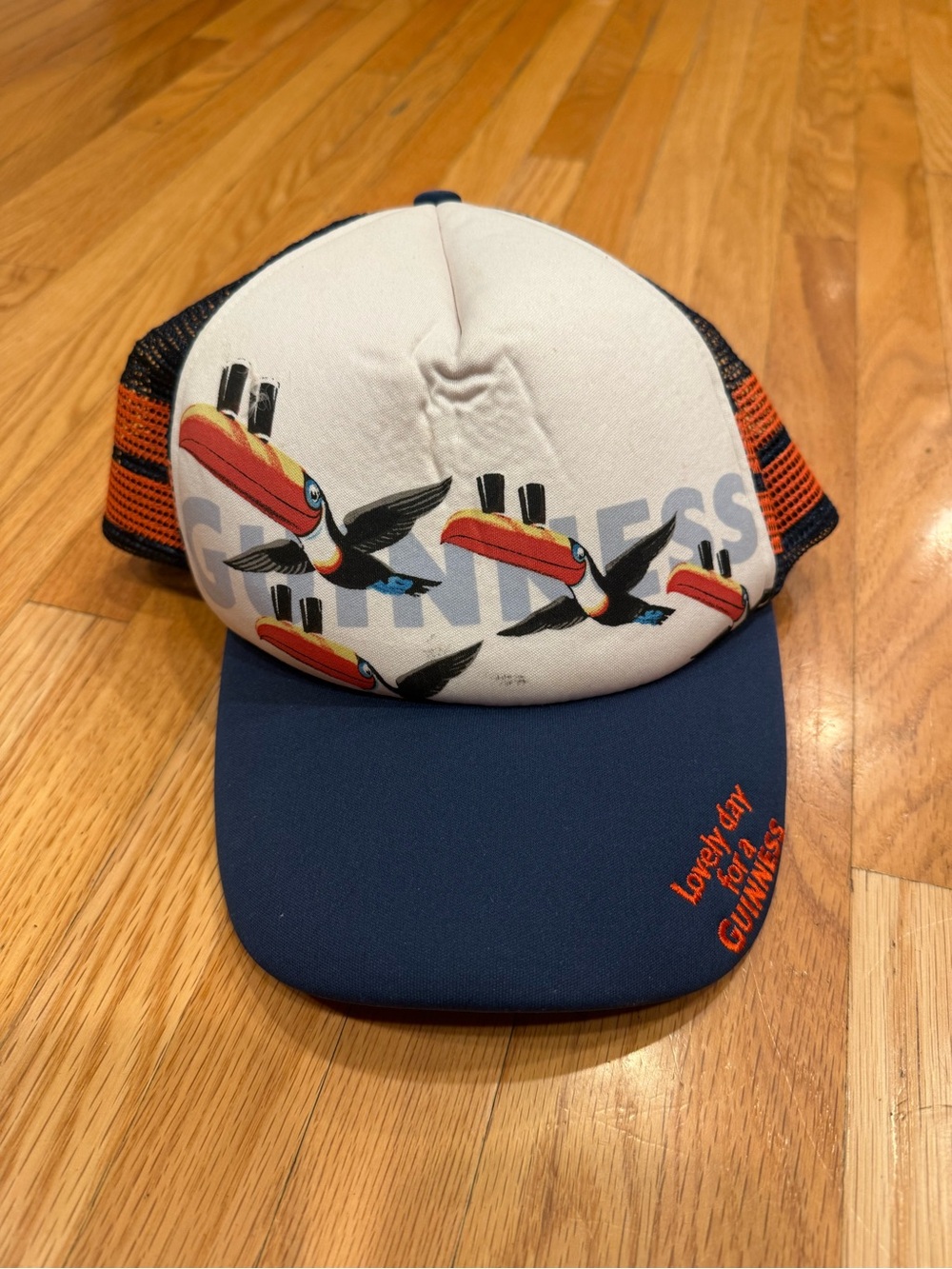 Guinness White Front Navy Bill Toucan Mesh Cap with Orange Accents